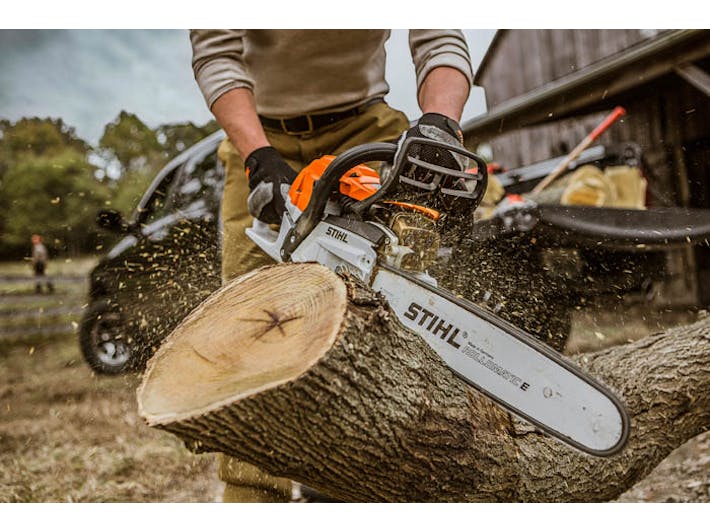 Close up of STIHL  MS 261 C-M Chainsaw cutting log