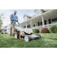 Close up of man mowing front yard with the STIHL RMA 510 V