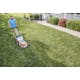 View from above of man mowing lawn with the STIHL RMA 510 V