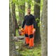 Man in Personal Protective Equipment standing in a forest