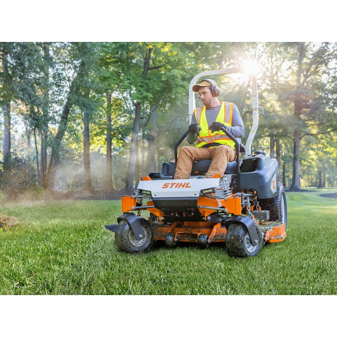 Man mowing lawn with STIHL RZ 752 K