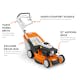 Diagram of RM 655 V pointing out the Mono-Comfort Handle, Vario Wheel Drive, Polymer Grass Bag and 21" Mowing Deck