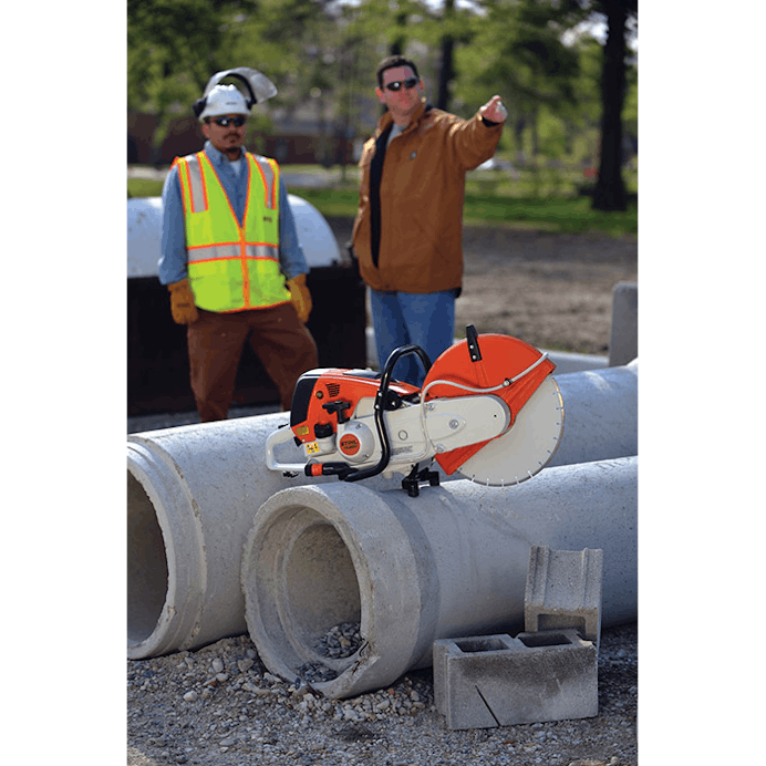 TS 800 STIHL Cutquik® sitting atop a concrete pip with men standing behind