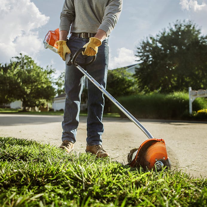 Man using FC 70 on edge of sidewalk