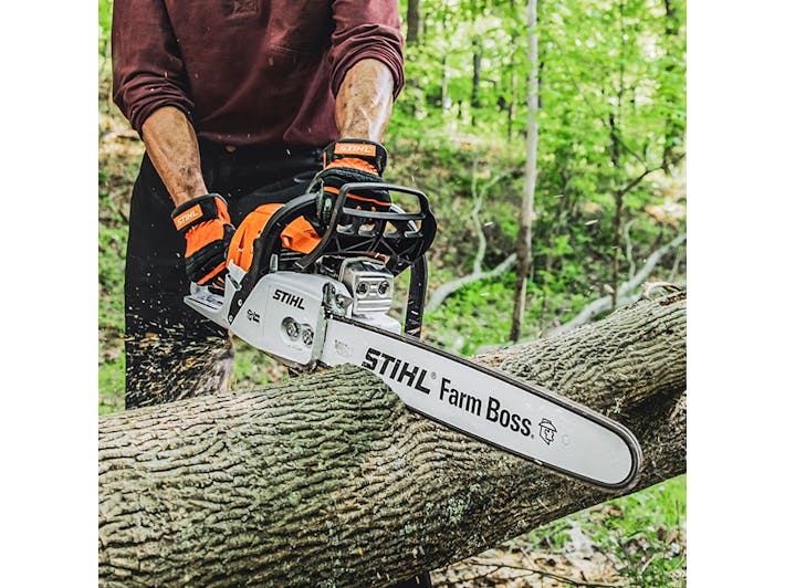 Close up with MS 271 FARM BOSS® cutting a log
