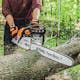 Close up with MS 271 FARM BOSS® cutting a log